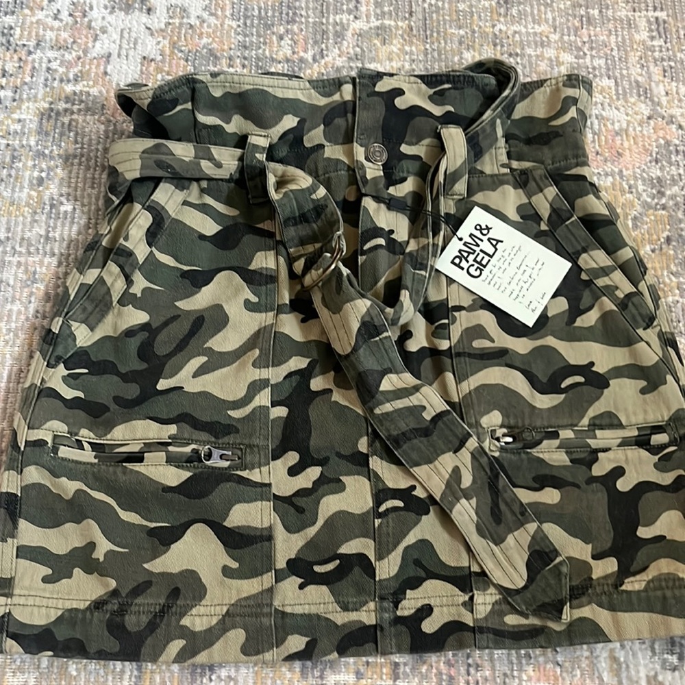 Pam & Gela camo jean skirt with belt and two zip pockets on the front! NWT.